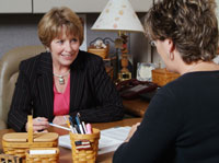 Student receives help from staff advisor